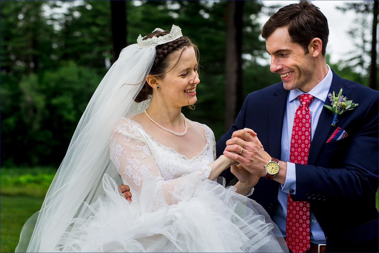 The bride and groom dance together in New Hampshire