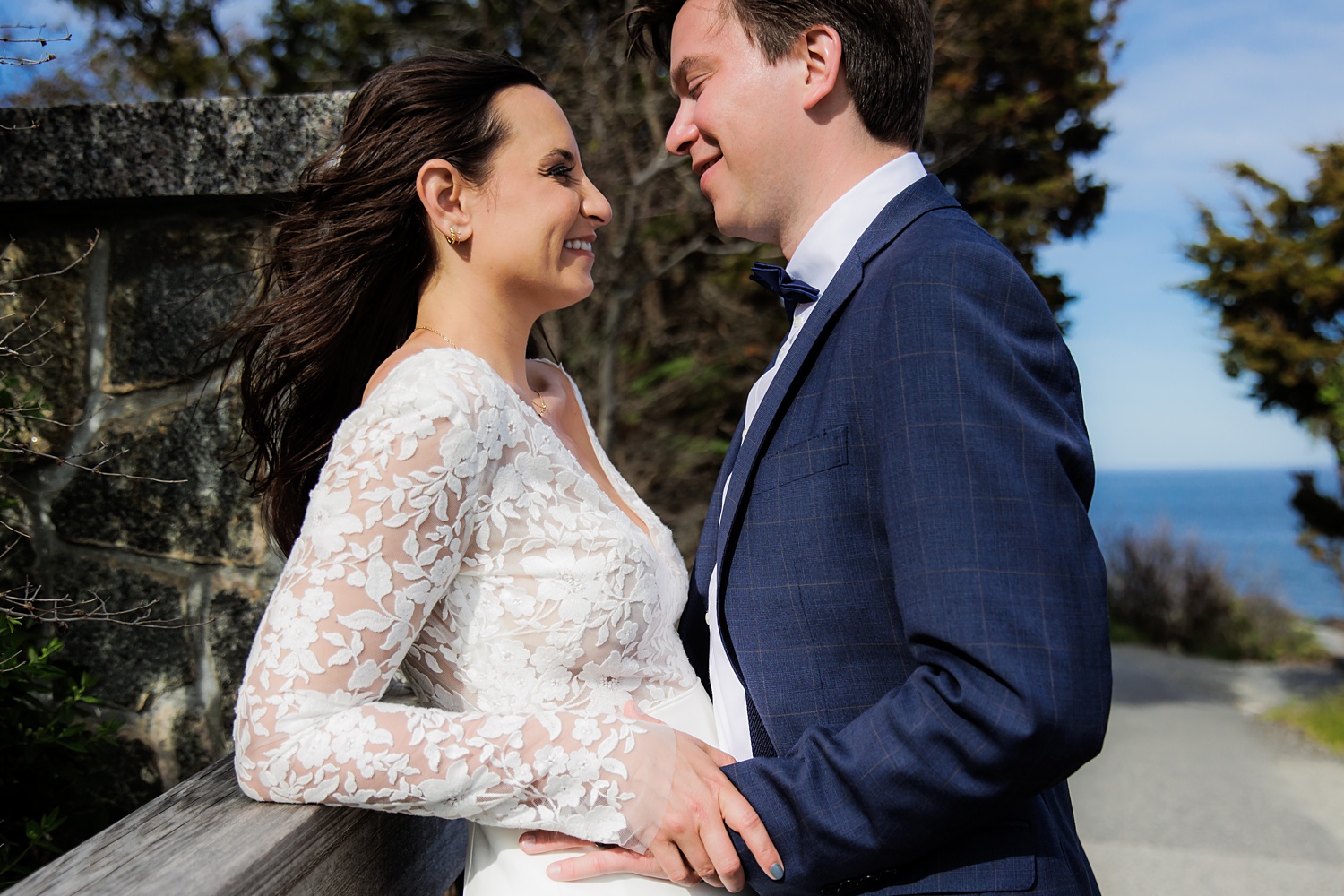 The couple can't stop smiling after a sunny Maine elopement