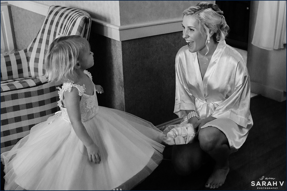 The bride and her flower girl play in the Portsmouth hotel before she gets into her wedding dress