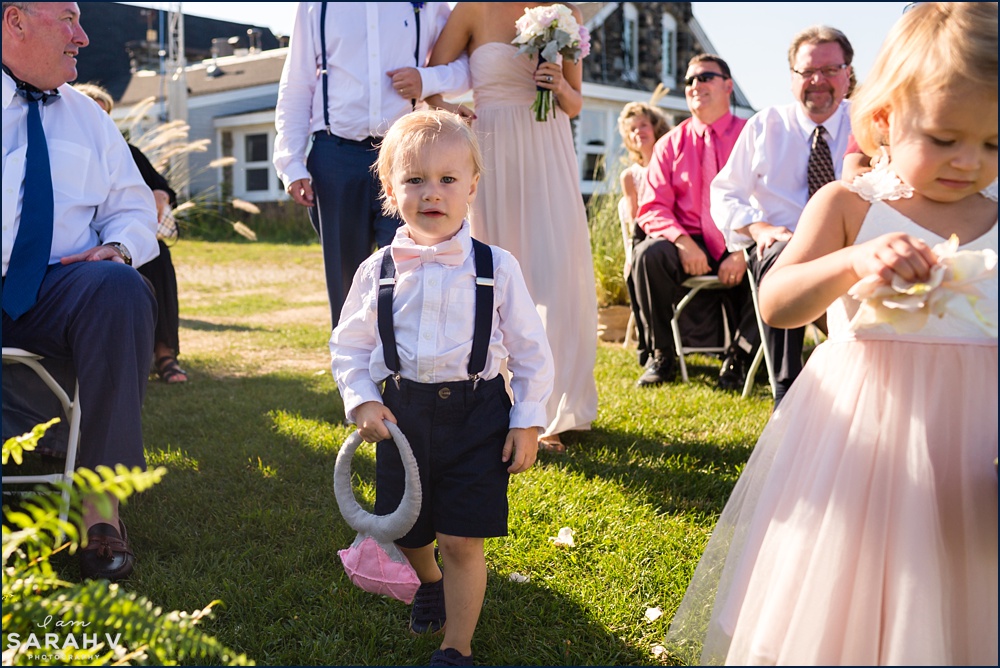 The ring bearer and the flower girl make their wedding ceremony appearance