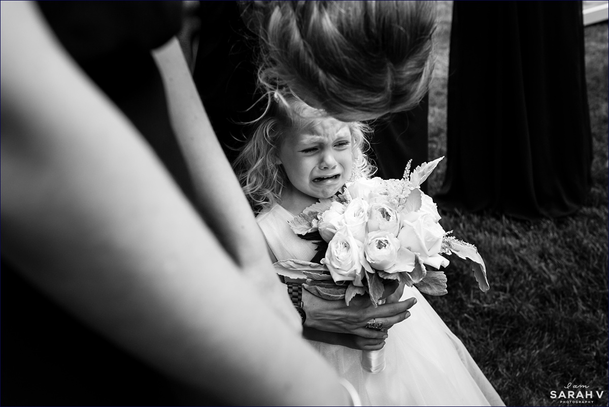 One of the flower girls was not pleased with having to have her picture taken