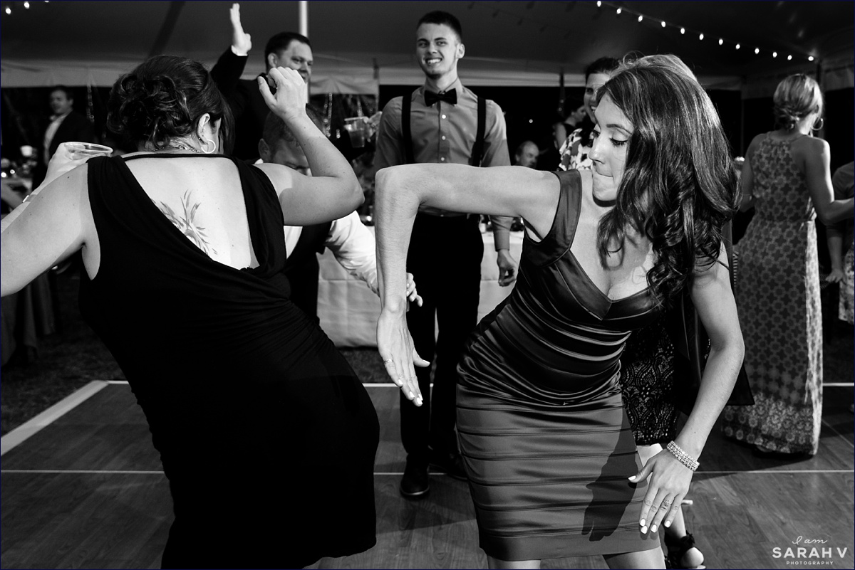 The guests have a lot of fun at the wedding reception dancing with friends