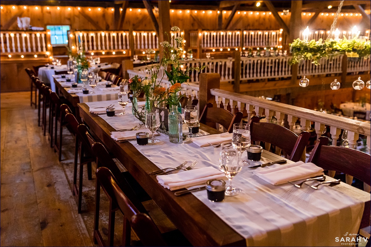 The barn is decorated in rustic style for the couple's summer wedding in Tamworth NH