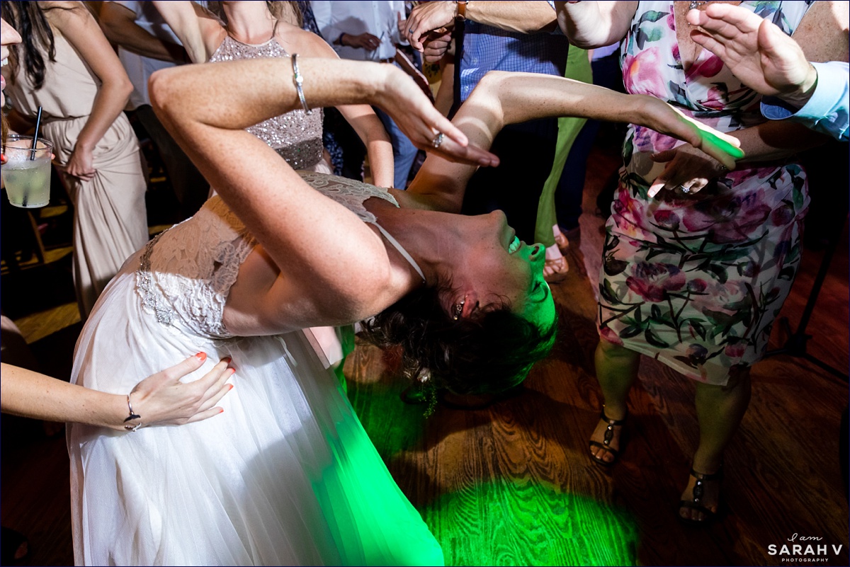 The bride does an incredible backbend on the dance floor at her Preserve at Chocorua wedding in NH