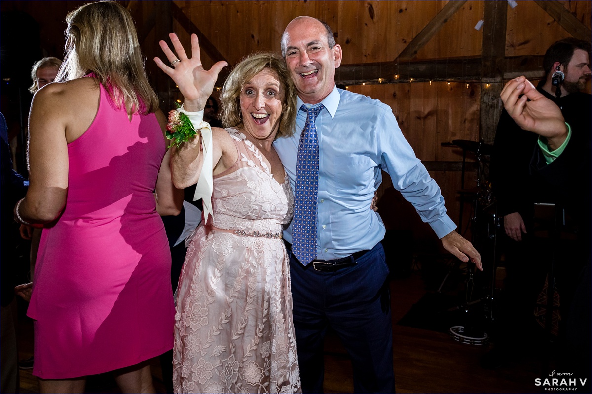 The parents of the bride dance all night long at the barn wedding for their daughter