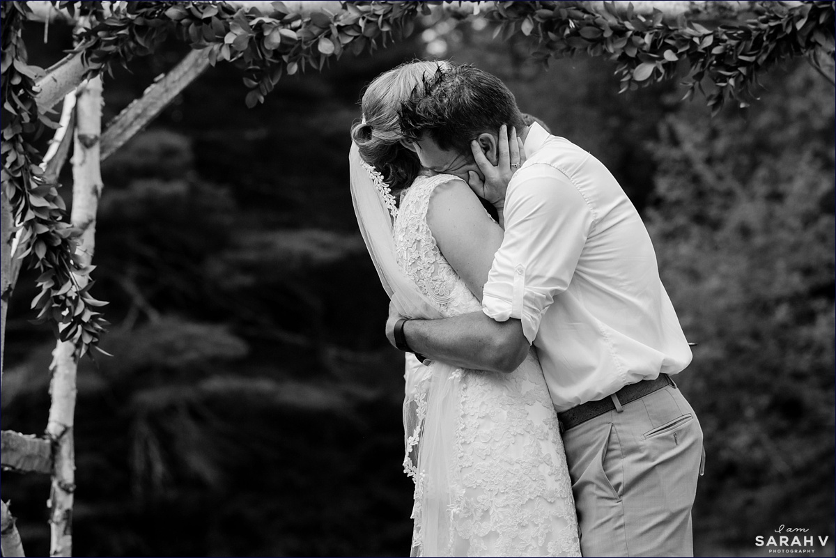 The Preserve New Hampshire Wedding Photographer NH Mt. Chocorua in Tamworth Lake Woods Greenery Ceremony on the lawn first kiss