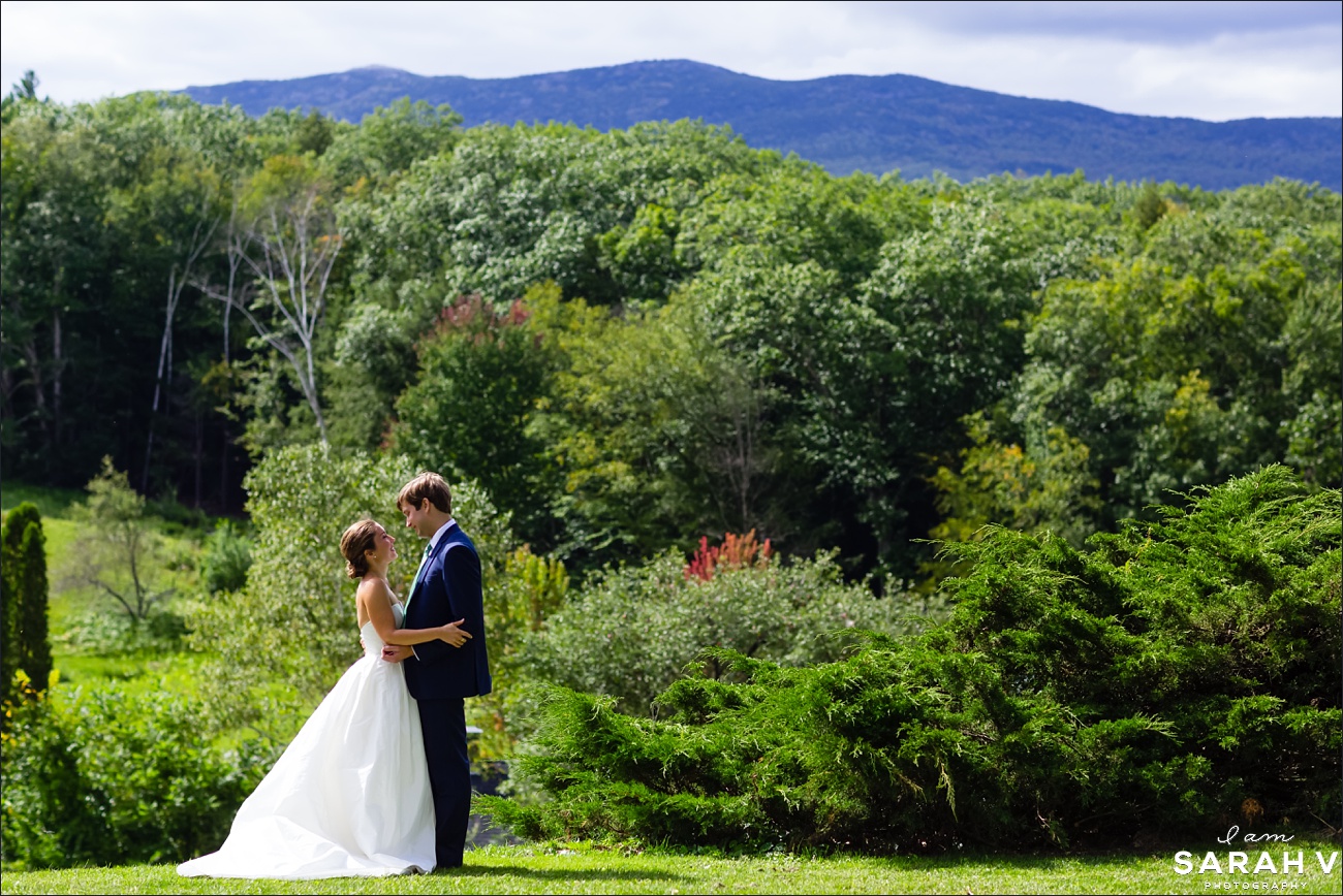 Mount Monadnock New Hampshire Wedding Photographer the bride and groom enjoy a few moments together before the ceremony begins on the front lawn her family's farmhouse