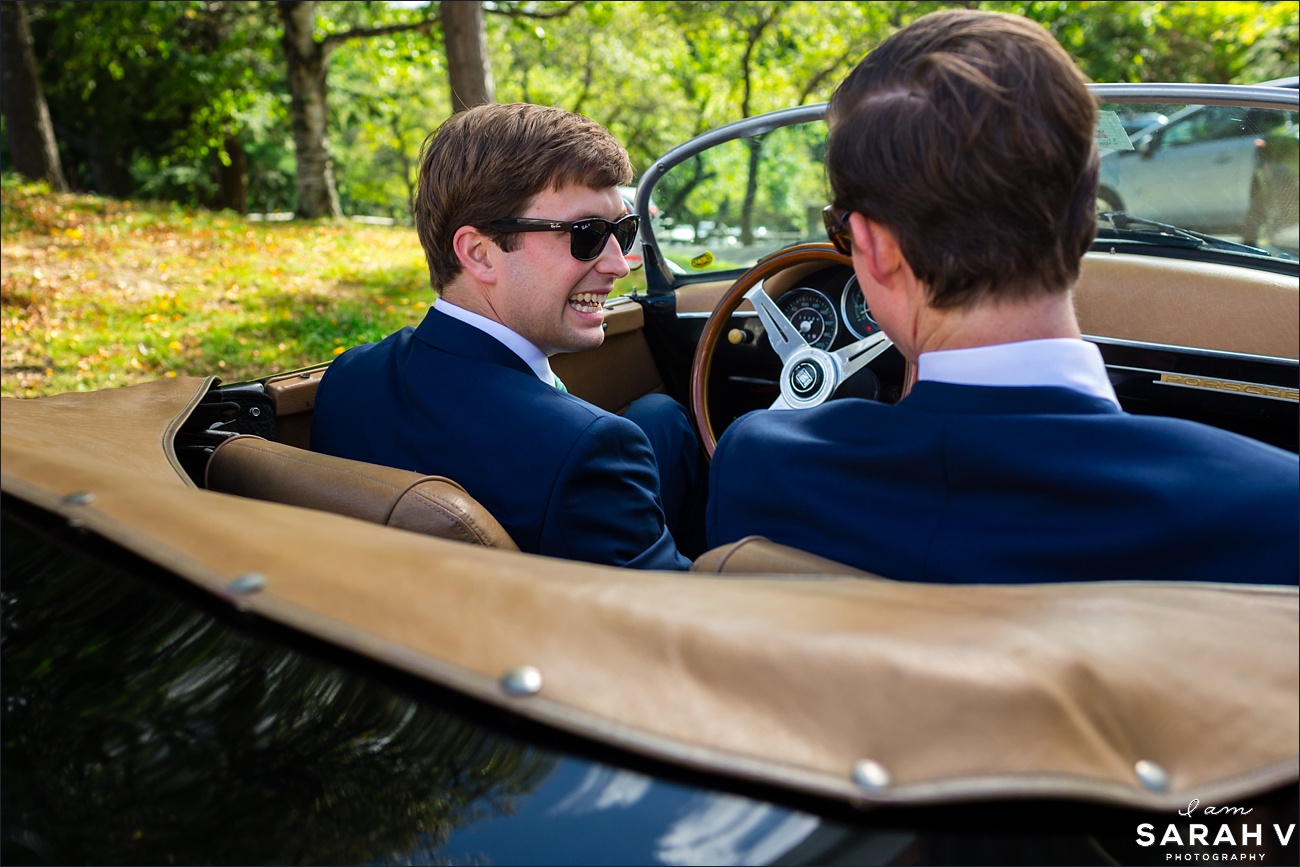 The groom and his best man drive a vintage car to the ceremony in Mount Monadnock New Hampshire
