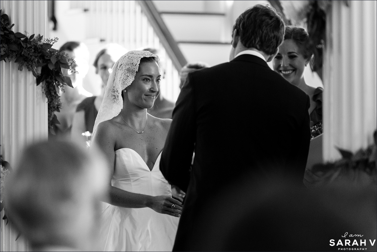 The bride smiles at her groom in their Jaffrey Meetinghouse NH wedding ceremony