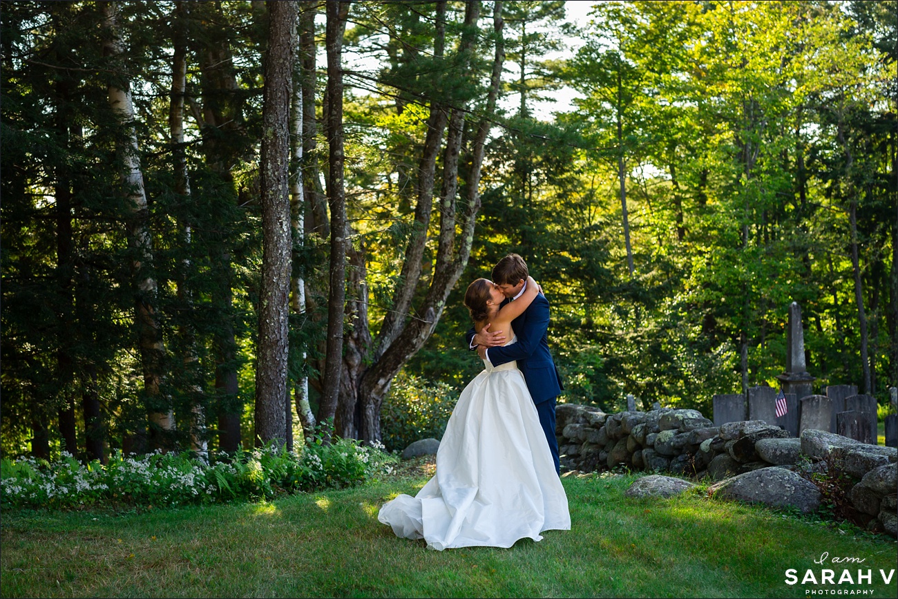 The bride and groom embrace outside the Jaffrey Meetinghouse ceremony site
