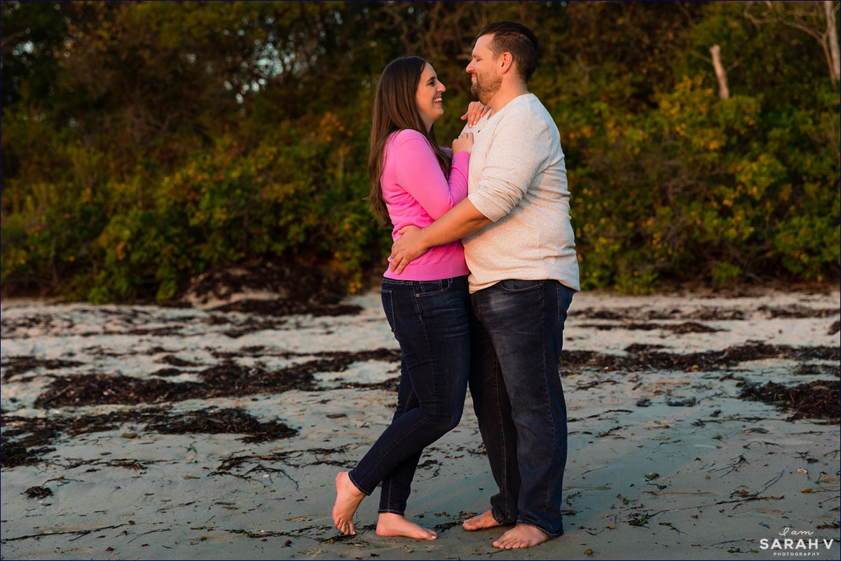 Kettle Cove Maine Wedding Photographers Engagement Session Portland Cape Elizabeth the bride and groom smile at one another on the beach