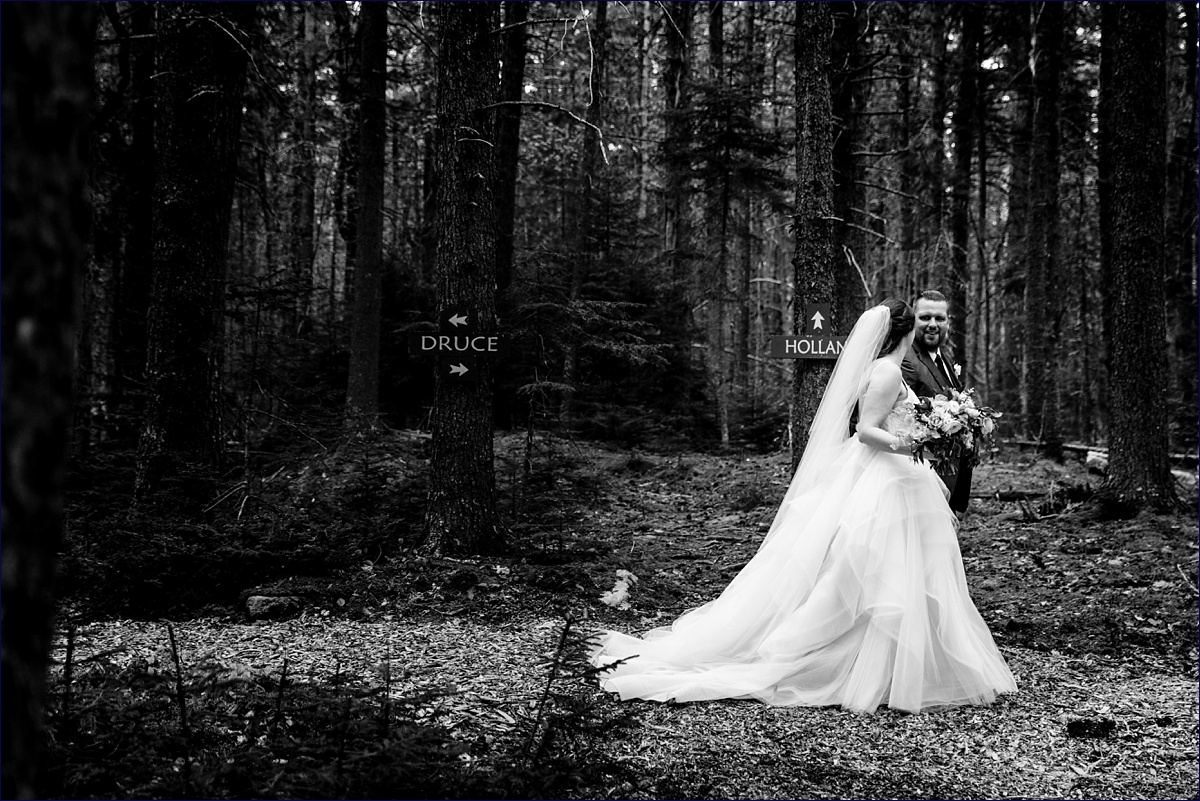 The newlyweds have a walk in the woods arm in arm