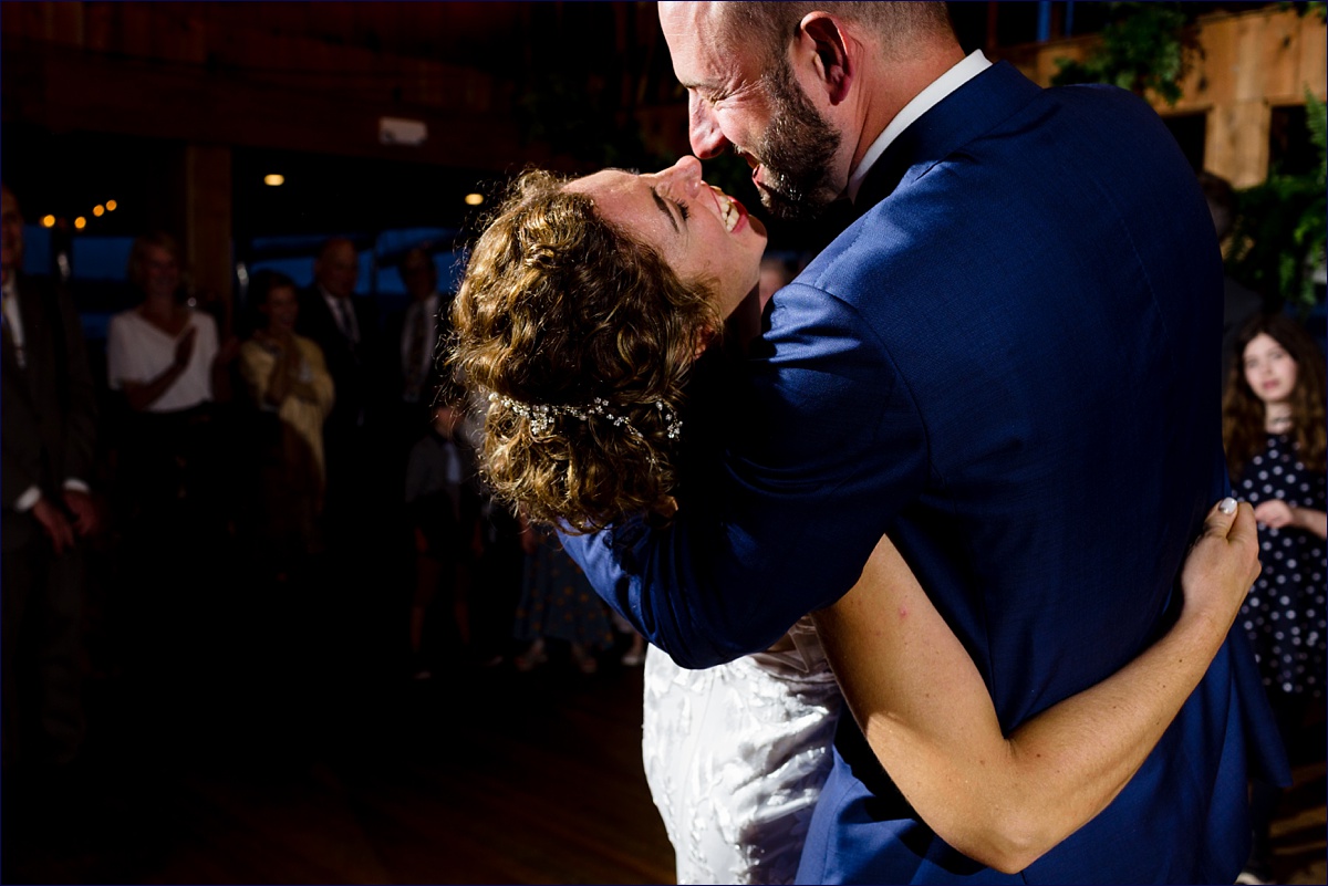 Linekin Bay Resort Wedding Photographer in Boothbay Maine the bride and groom have a fun dance together during the reception