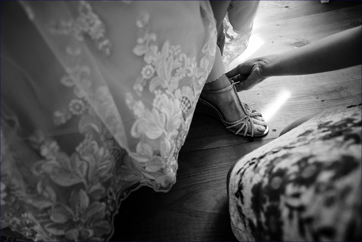 The bride gets into her wedding day shoes