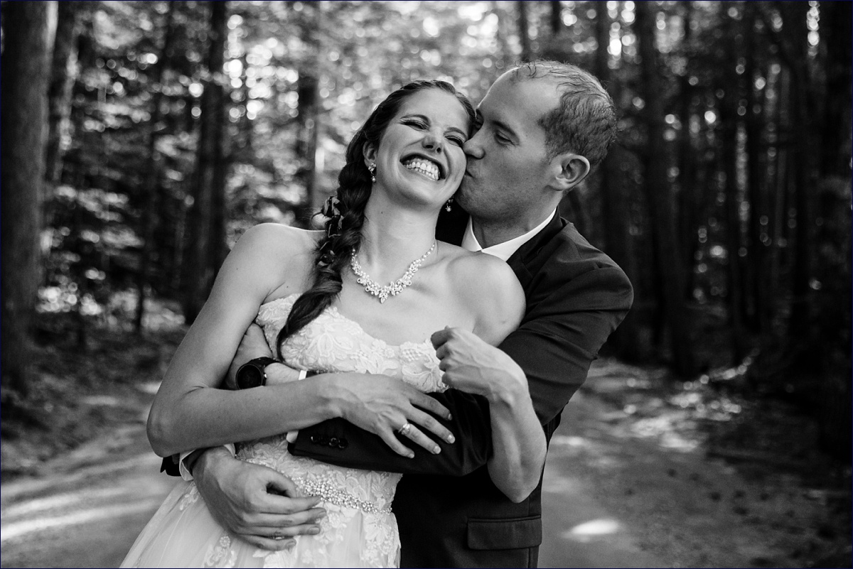 Preserve at Chocorua New Hampshire Wedding the bride and groom enjoy getting in close on their wedding day in the NH woods