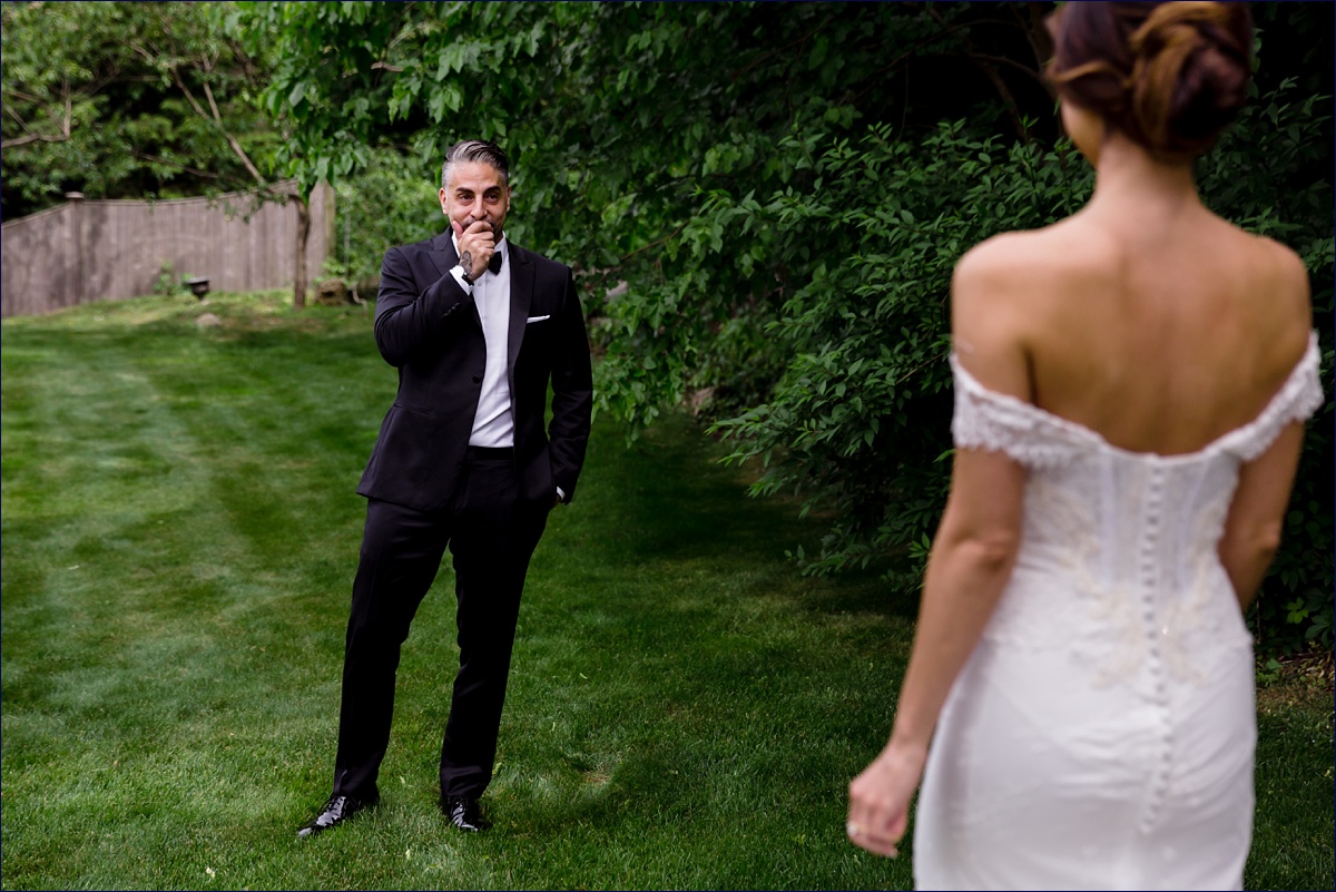 Greek Orthodox Massachusetts Wedding Photographer the groom sees his bride for the first time during the first look and he gets emotional