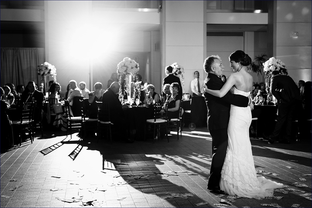 The bride and her father dance at the wedding reception at the Peabody Essex Museum