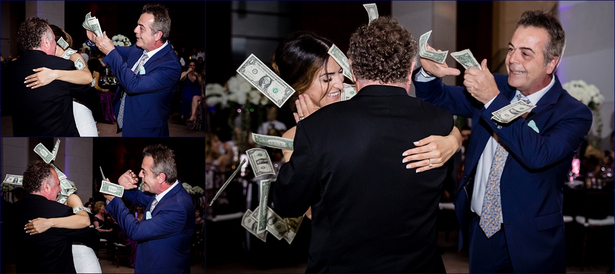 Peabody Essex Museum Wedding Photographer Greek Orthodox Massachusetts the bride and her father dance at her reception while guests shower them with money as a Greek tradition and custom