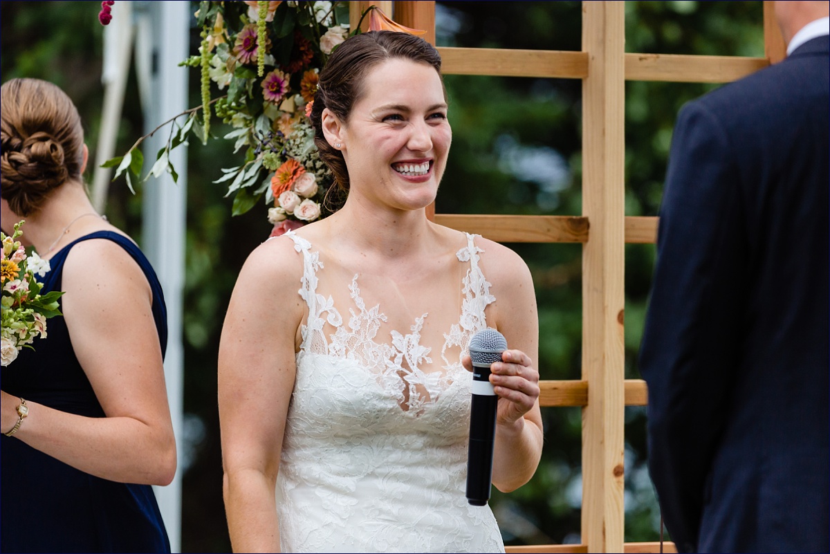 The bride laughs during the coastal Maine wedding ceremony