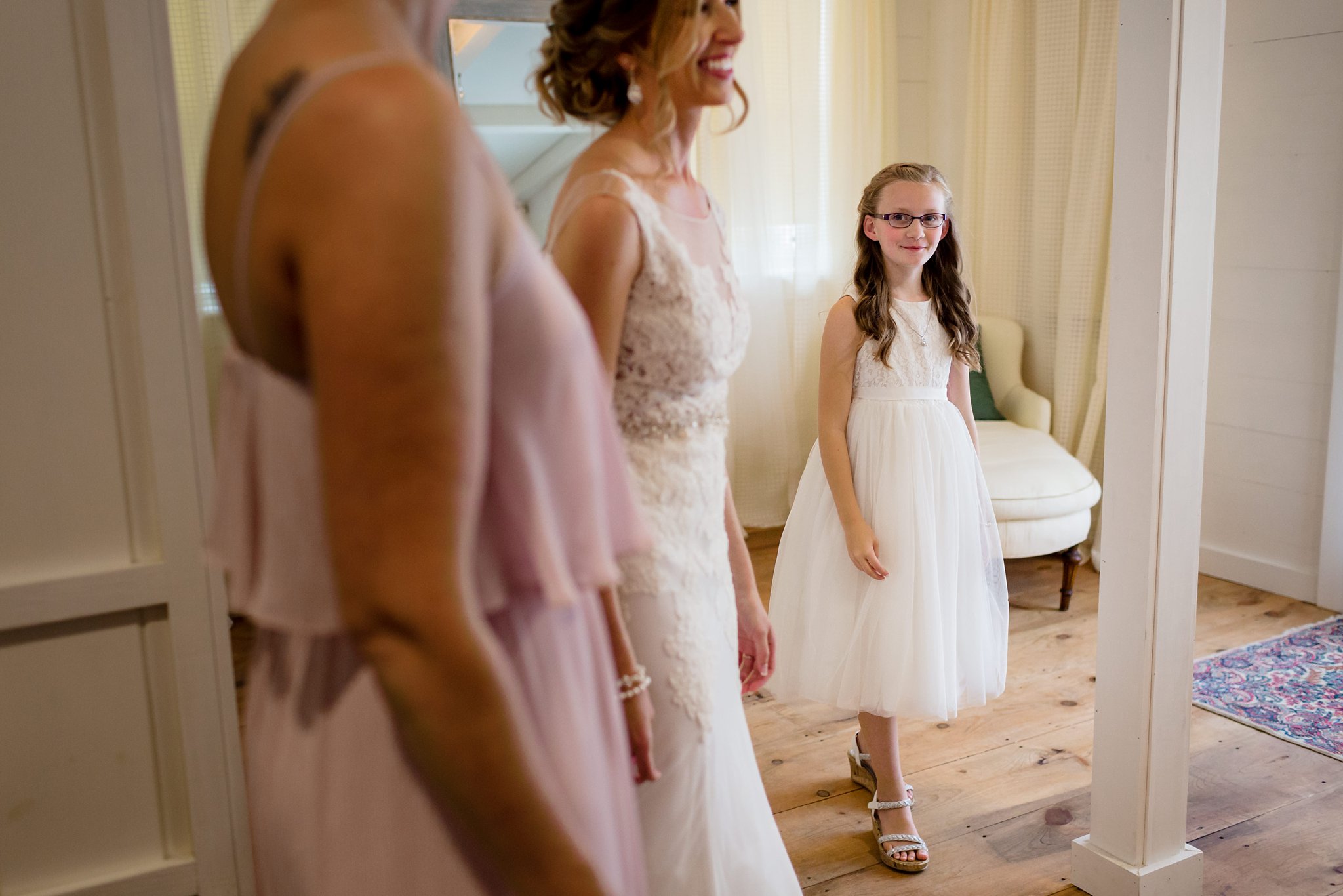 The flower girl enjoys the last moments before the ceremony starts in New Hampshire