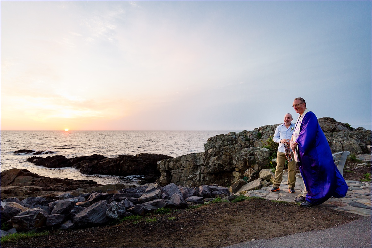 Groom watches as the bride arrives at their ceremony on Marginal Way in Maine