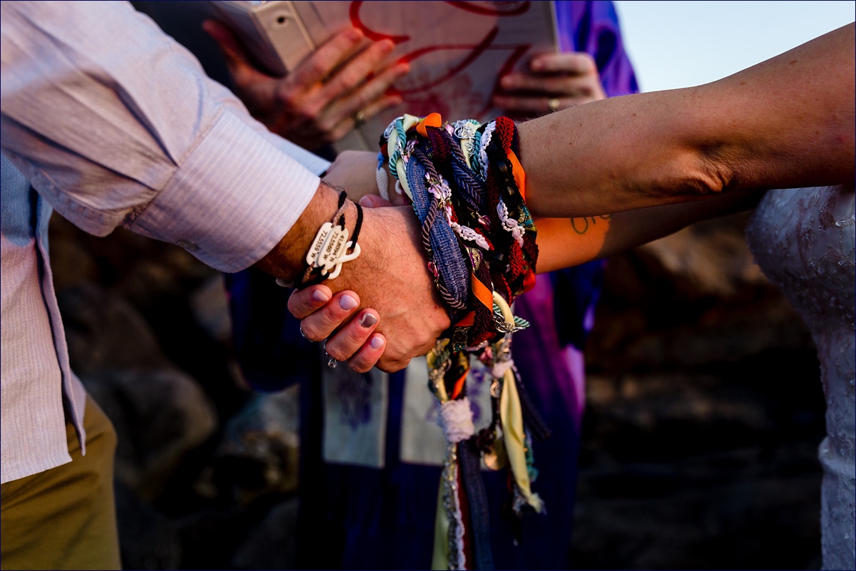 Celtic handfasting ceremony at their sunrise elopement