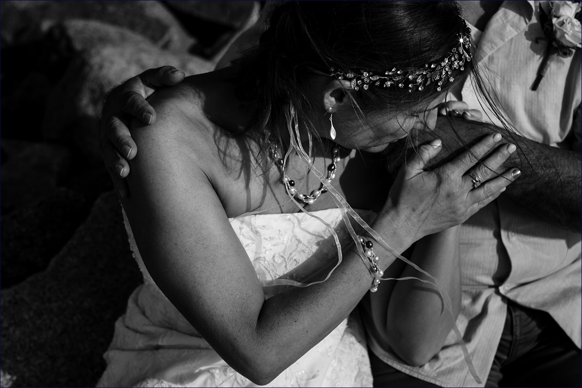 Bride kisses her new husband's hand