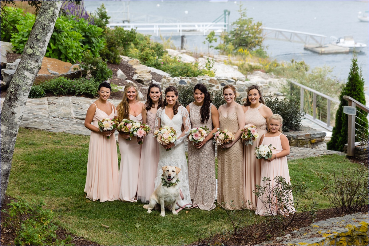 Boothbay Harbor Maine bride and her bridesmaids with the couple's dog get ready for the wedding day festivities