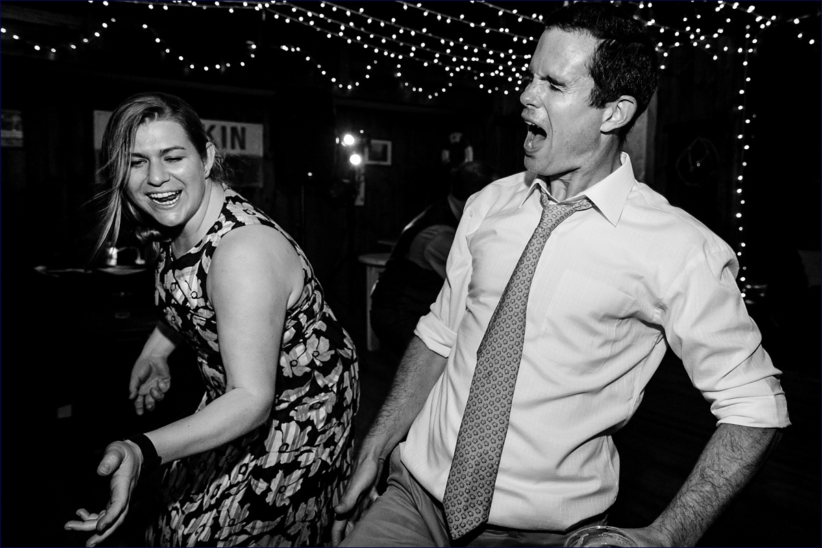 Wedding guests dance and have fun at the reception