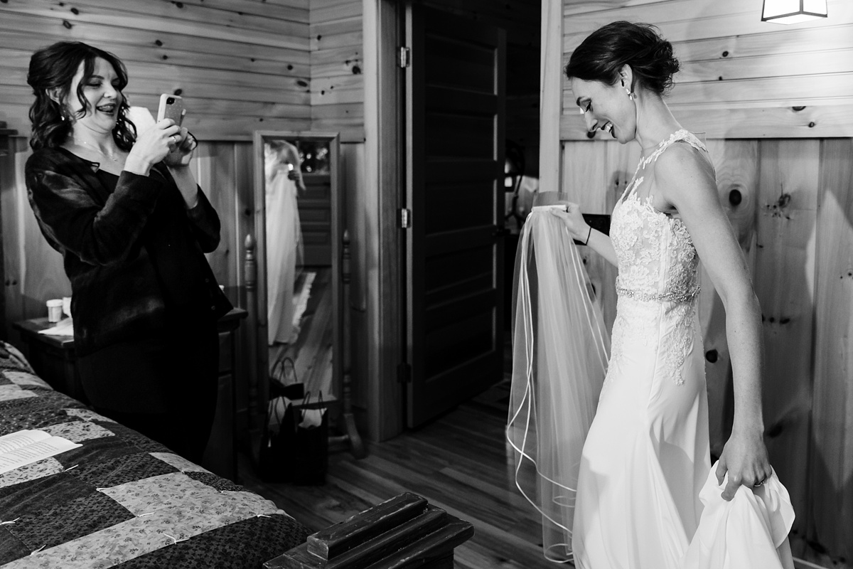 The bride gets into her wedding dress on her wedding day