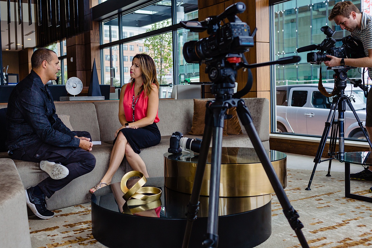 Amanda Hill interviews fashion photographer Nigel Barker for 207 Maine News Center at the AC Hotel in Portland Maine