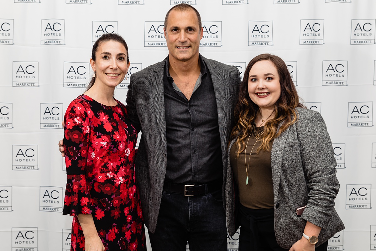 Nigel Barker poses with the executives at the AC Hotel Portland Maine event