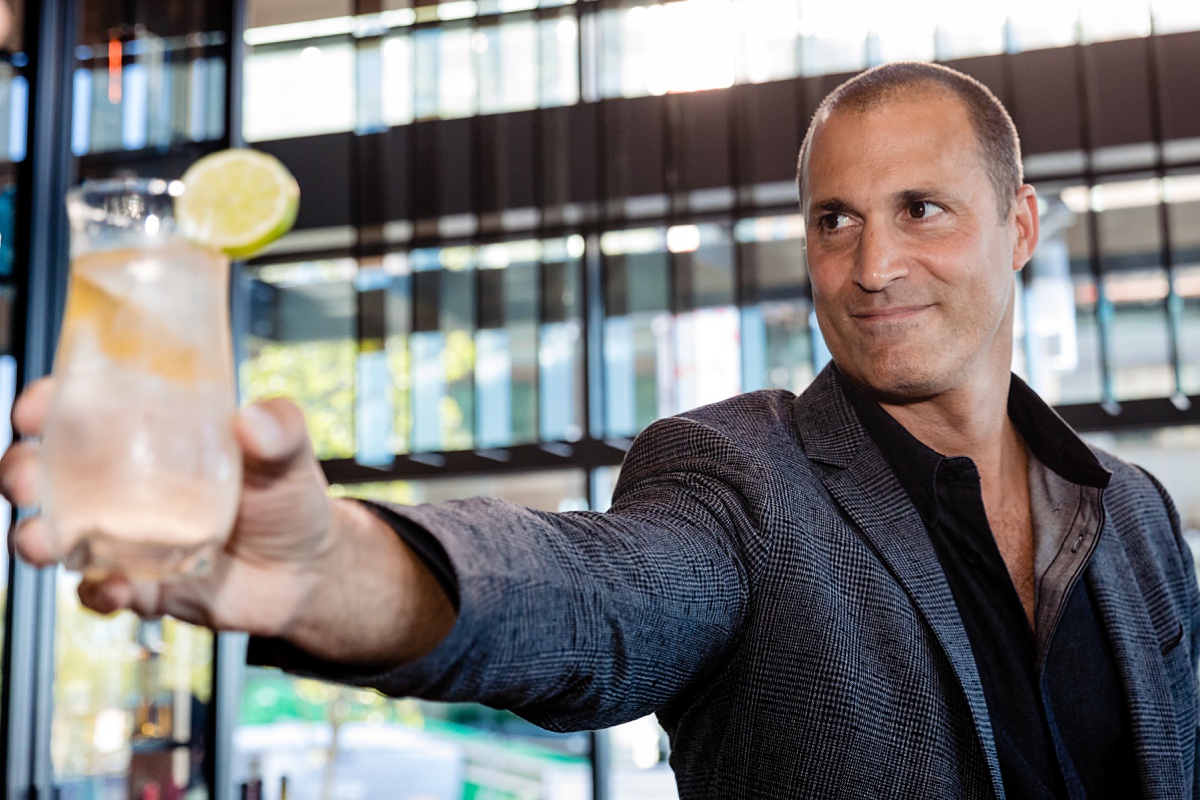 Nigel Barker toasts guests at AC Hotel Portland Maine event