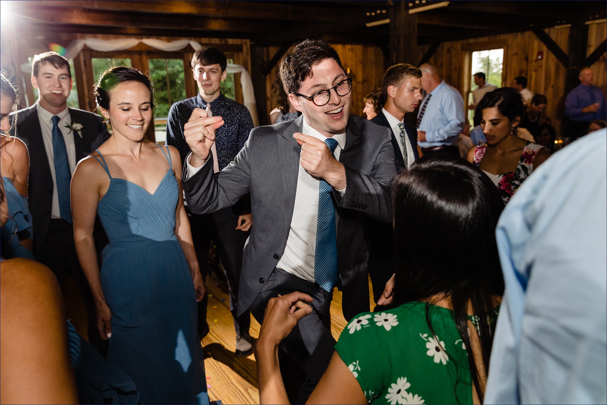 Dancing and partying inside the barn for the NH wedding reception