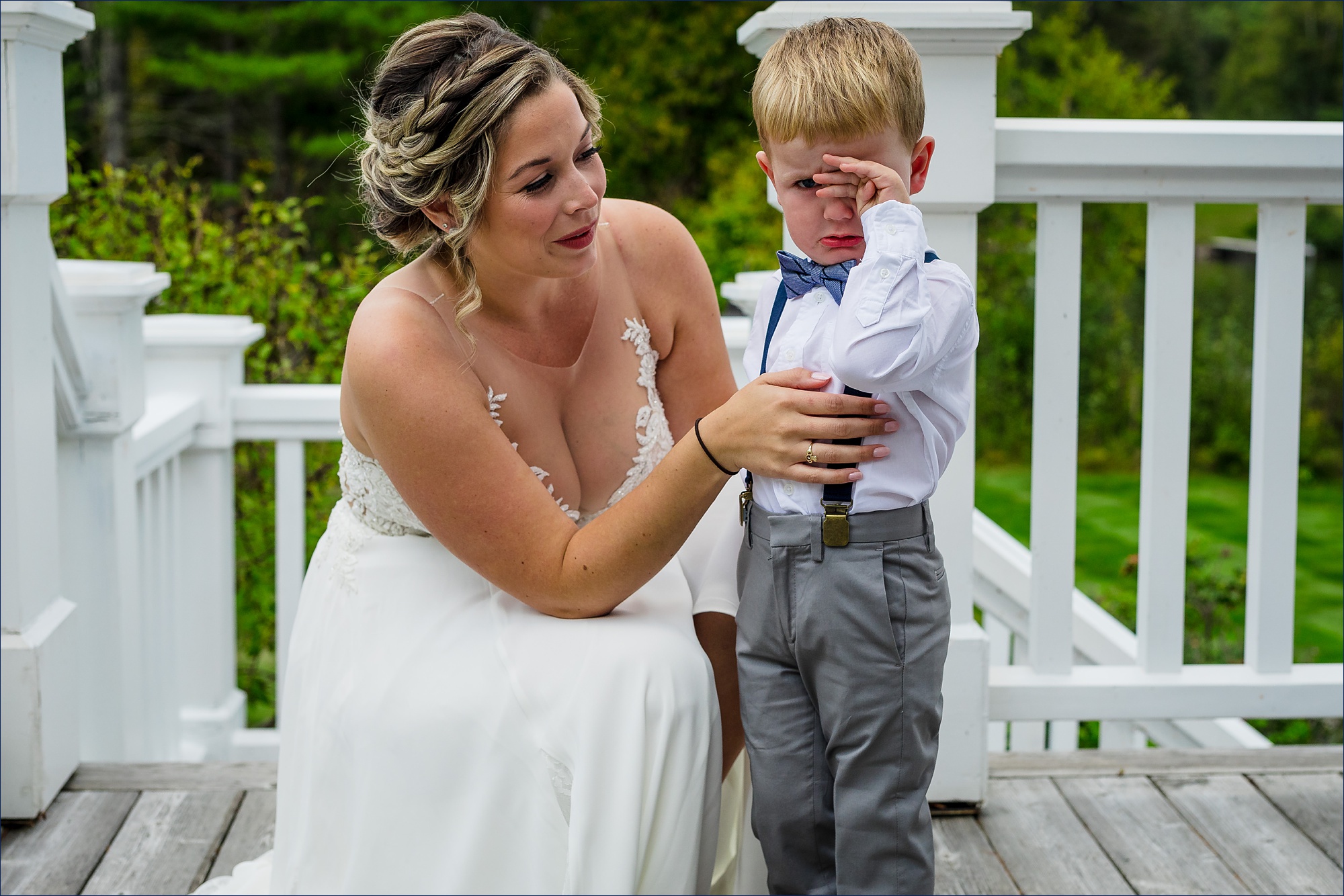The bride and her son share a moment together before heading off the Maine ceremony