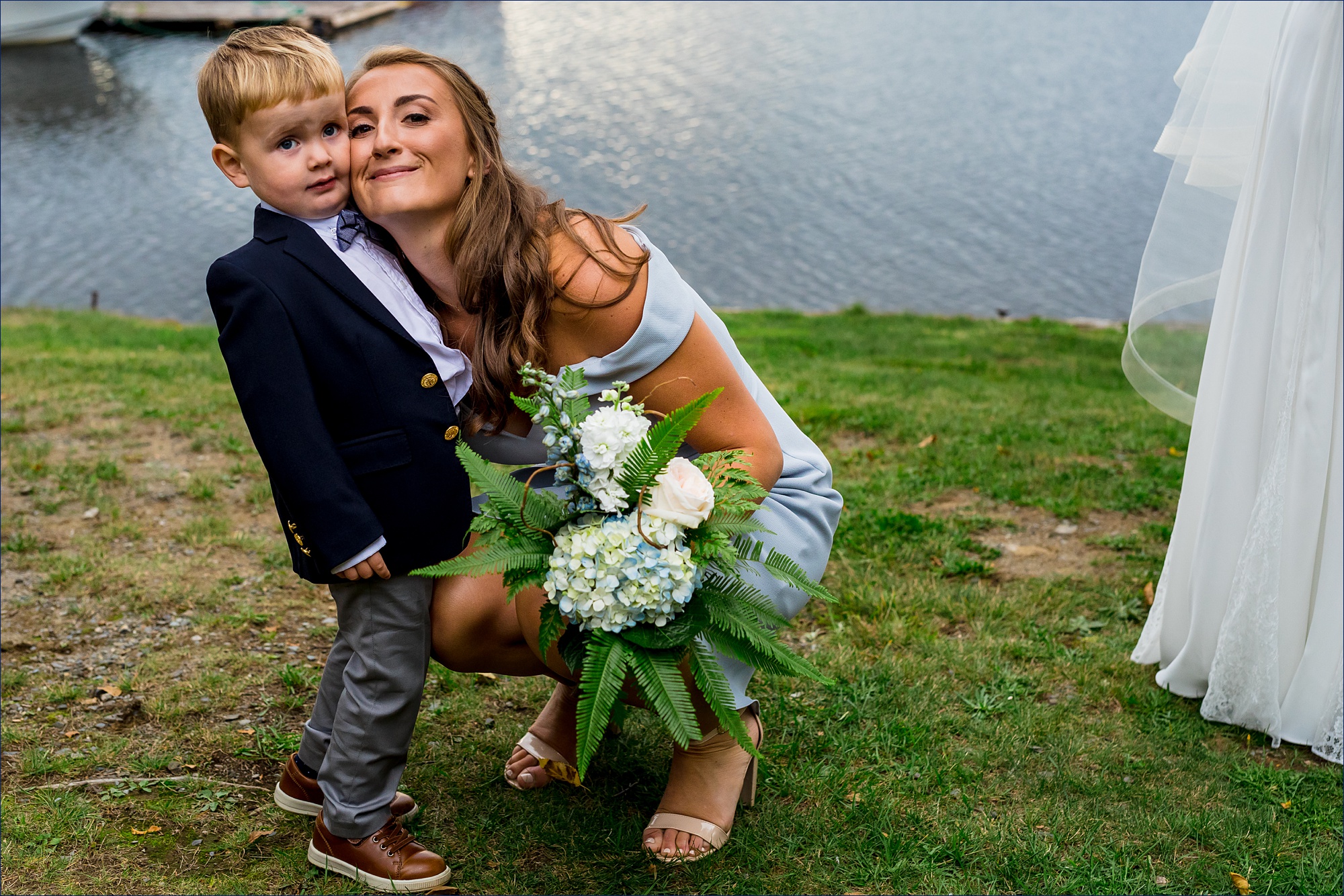 A bridesmaid tries to get close to the bride's son but he isn't too thrilled