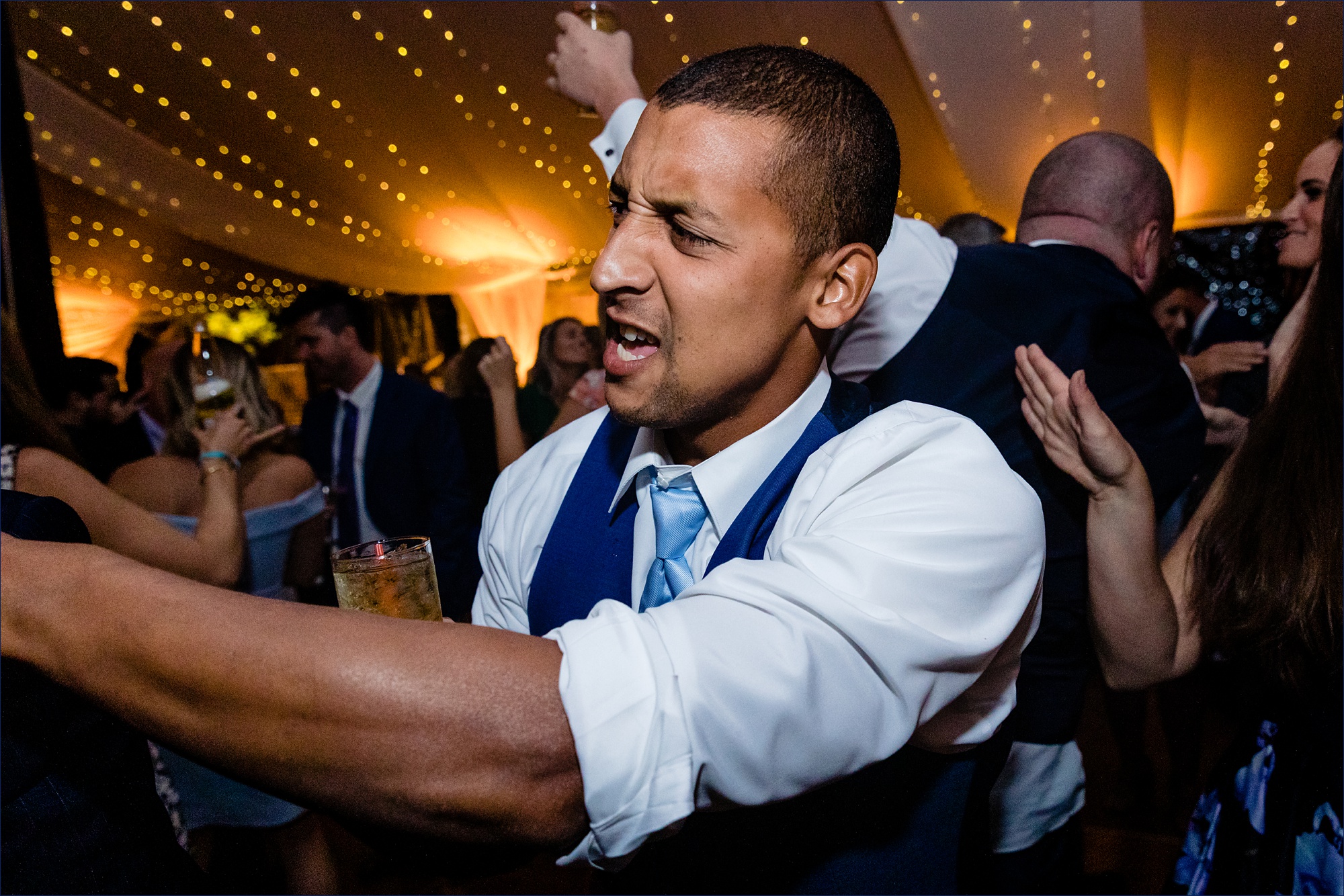 Guests get into the music at the Maine wedding reception