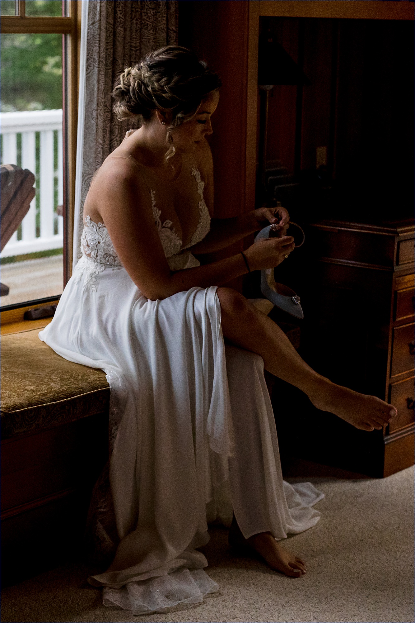 The bride gets into her wedding day shoes