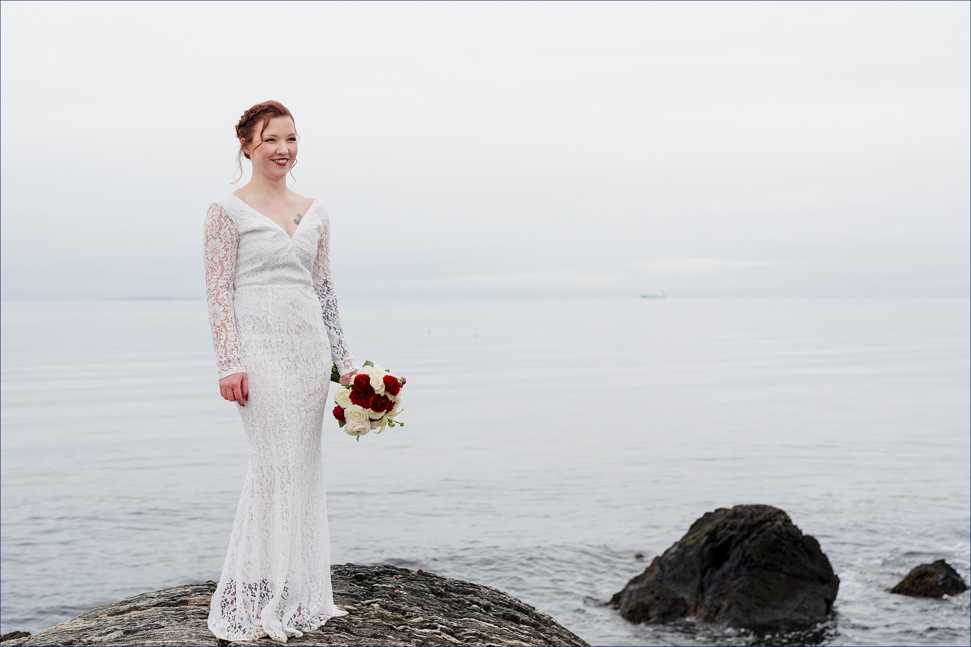 The bride on her elopement day out on Great Island Common NH