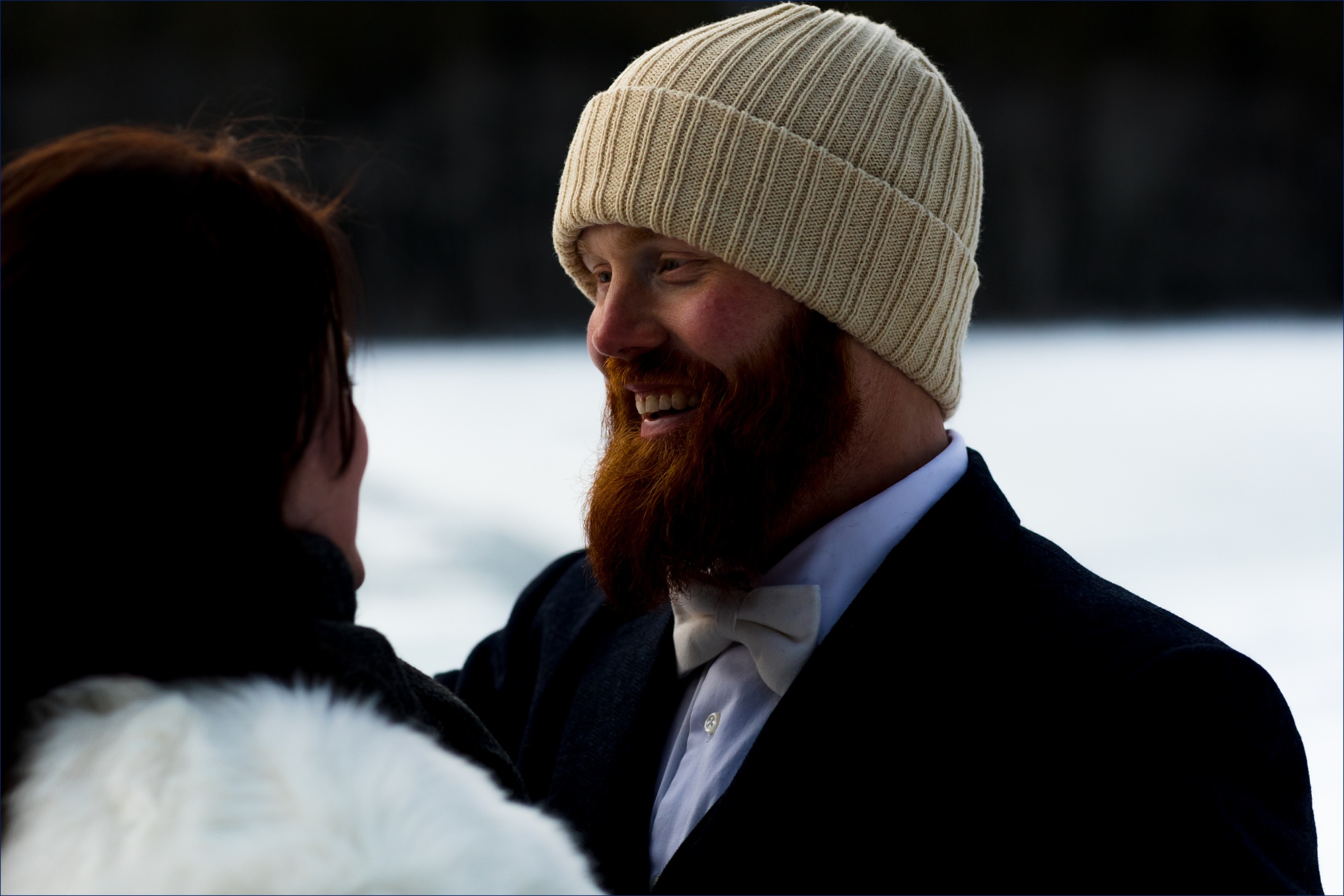 The groom smiles at the bride on their NH elopement