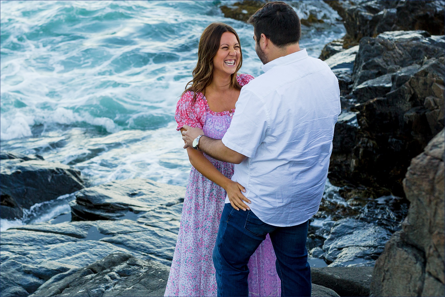 The couple laughs together out on Bald Head Cliff in Ogunquit Maine