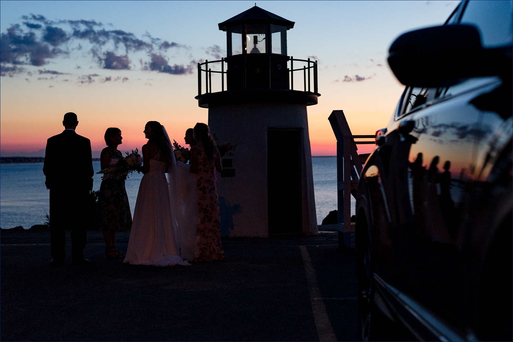 Ogunquit lighthouse at sunrise with the bride and her family