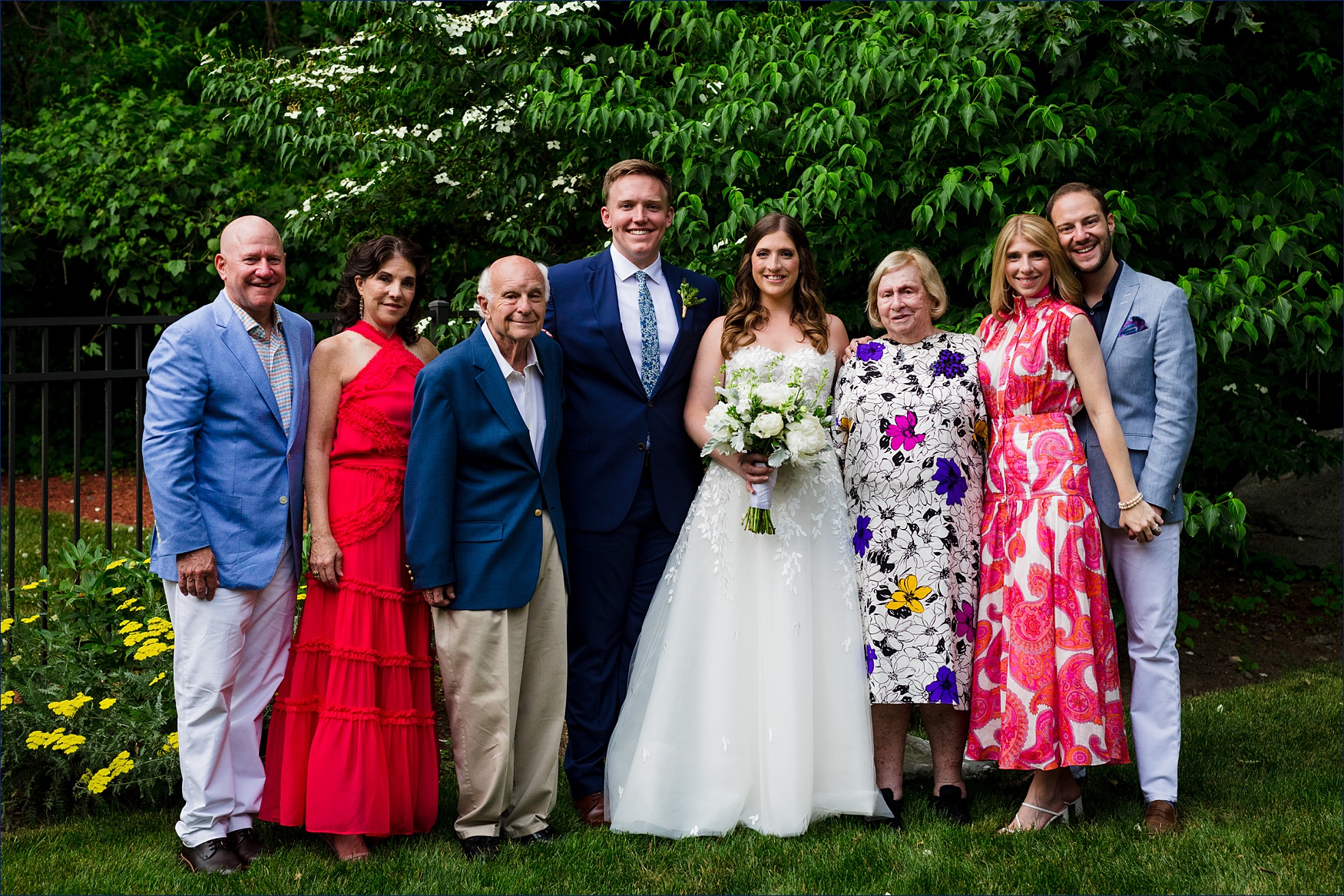 The family on the wedding day in their backyard for the intimate wedding celebration 