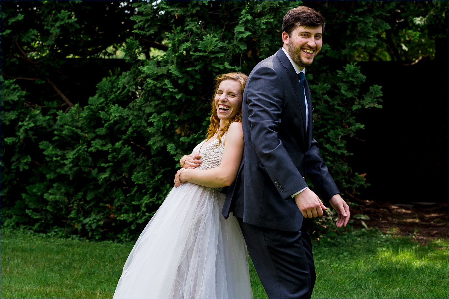 A funny joke gets the couple belly laughing on their intimate wedding day