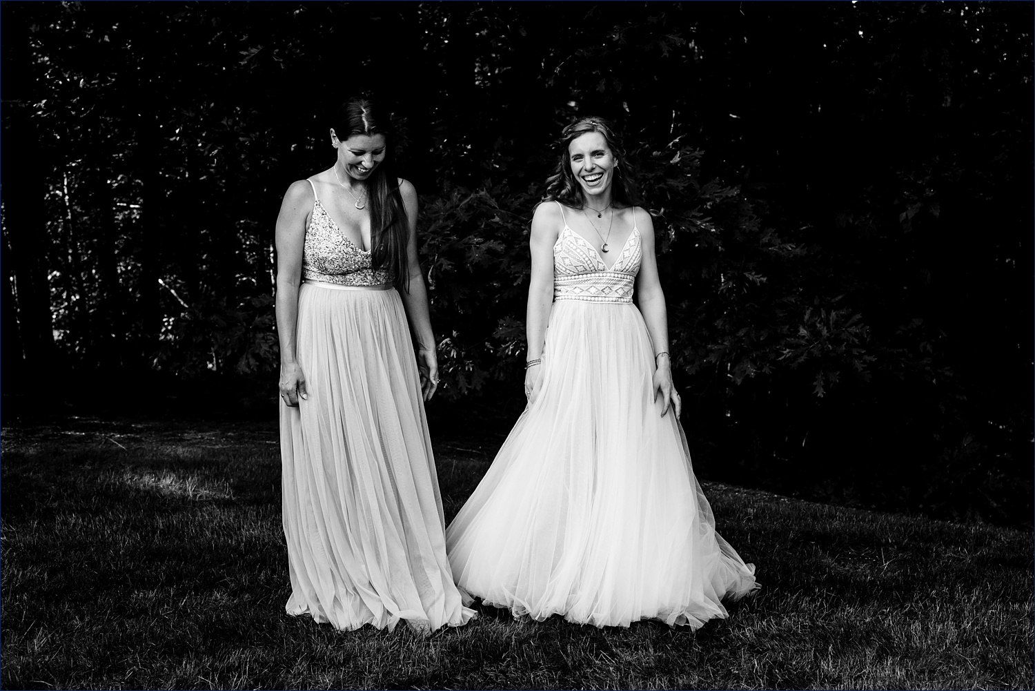 The bride and her sister dance on the intimate wedding day in MA
