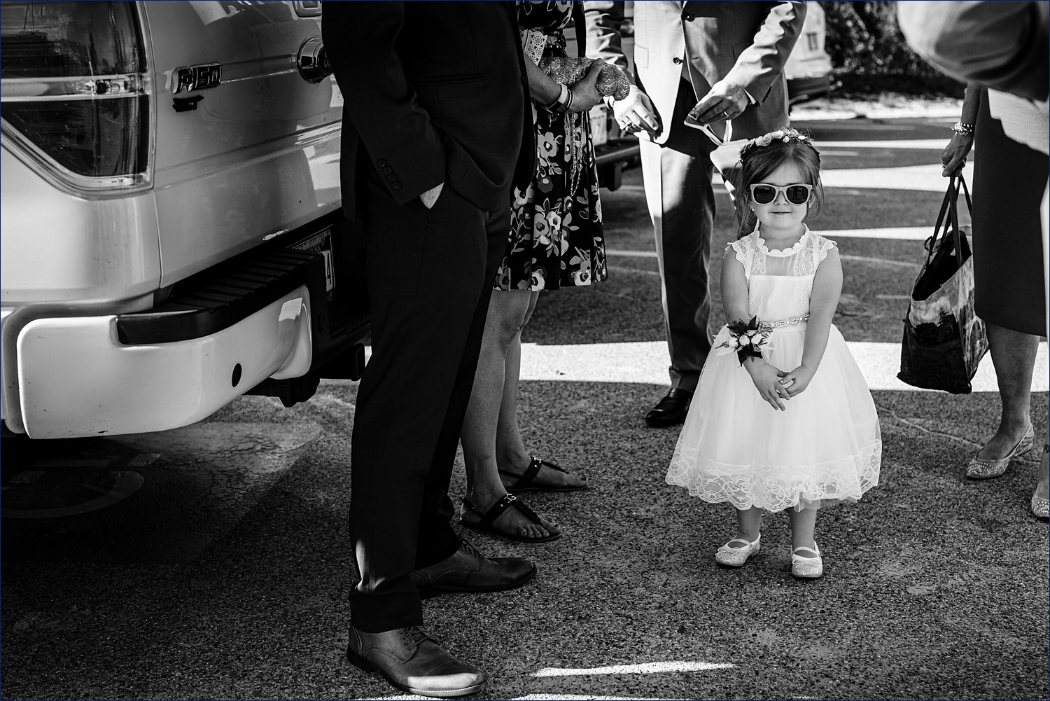 Flower girl gets ready for the elopement to begin in Maine