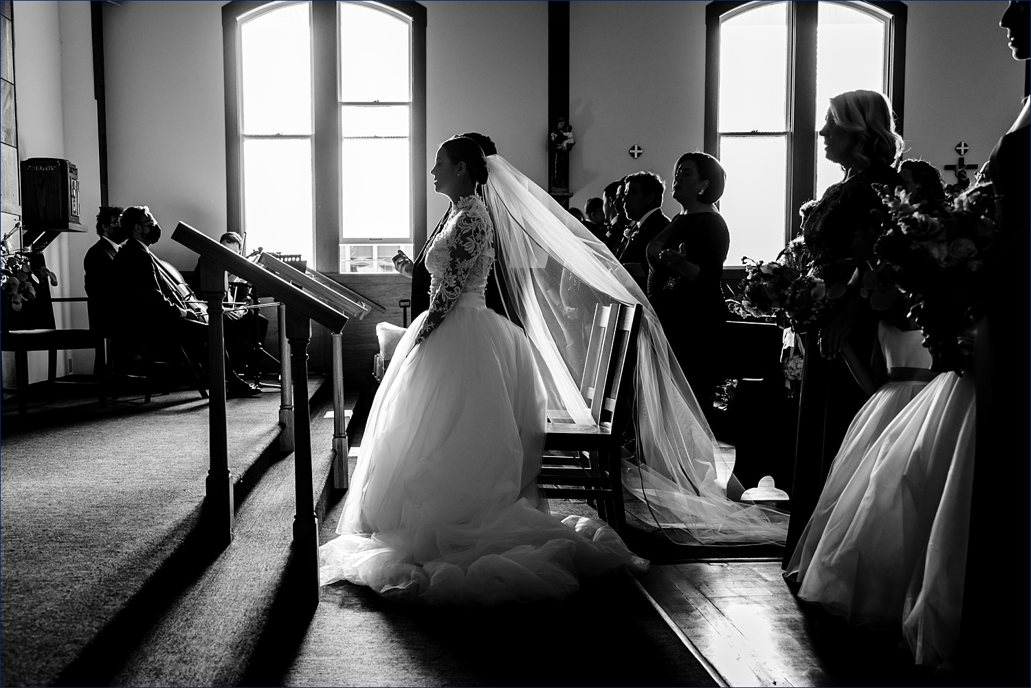 The wedding ceremony in Ogunquit Maine with the couple in silhouette