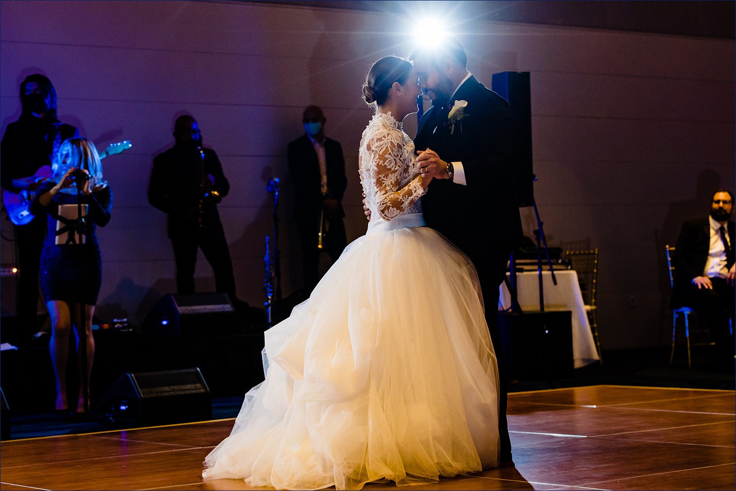 The first dance under the lights at the wedding reception