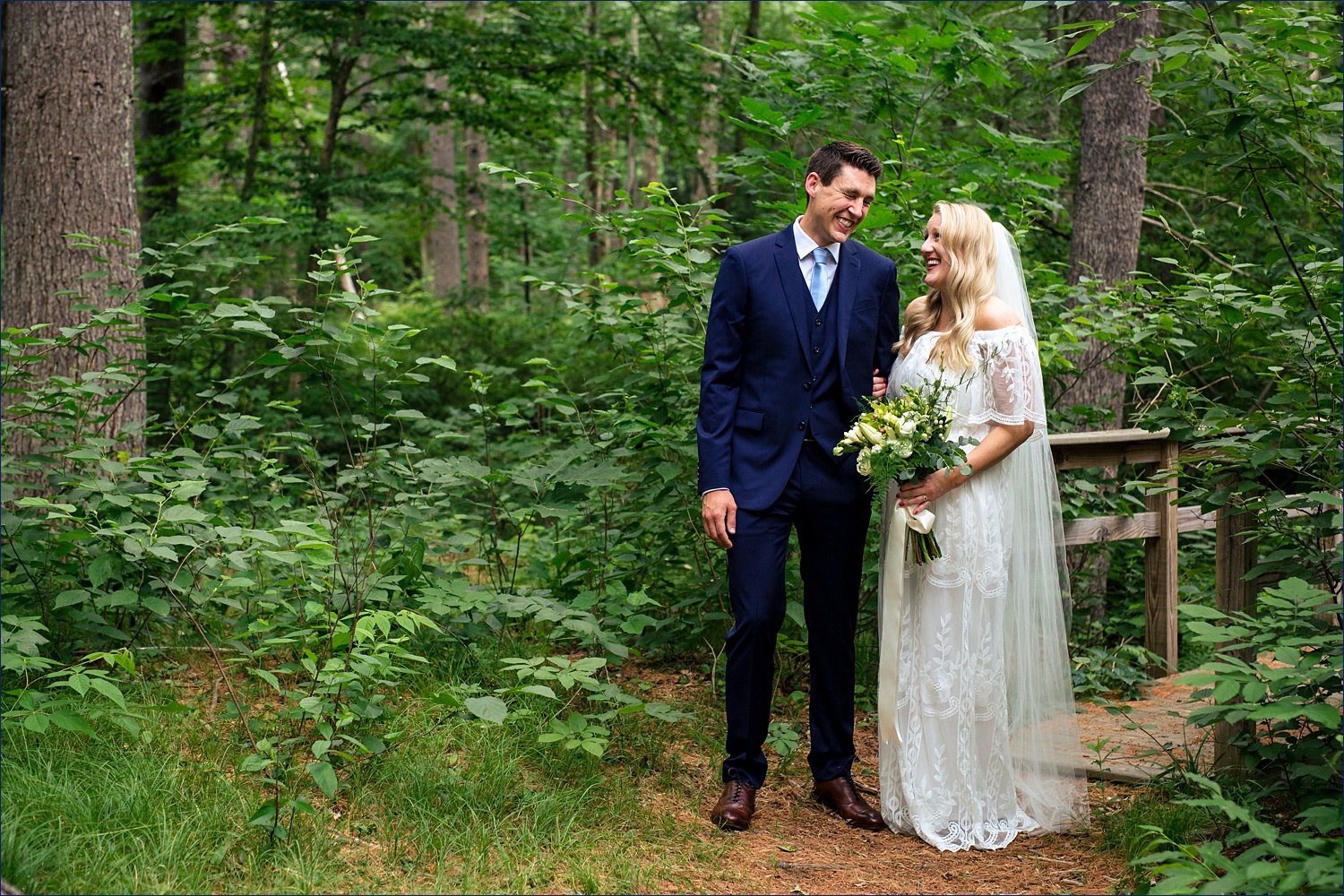 The bride and groom are all smiles on their New Hampshire wooded wedding day in Windham