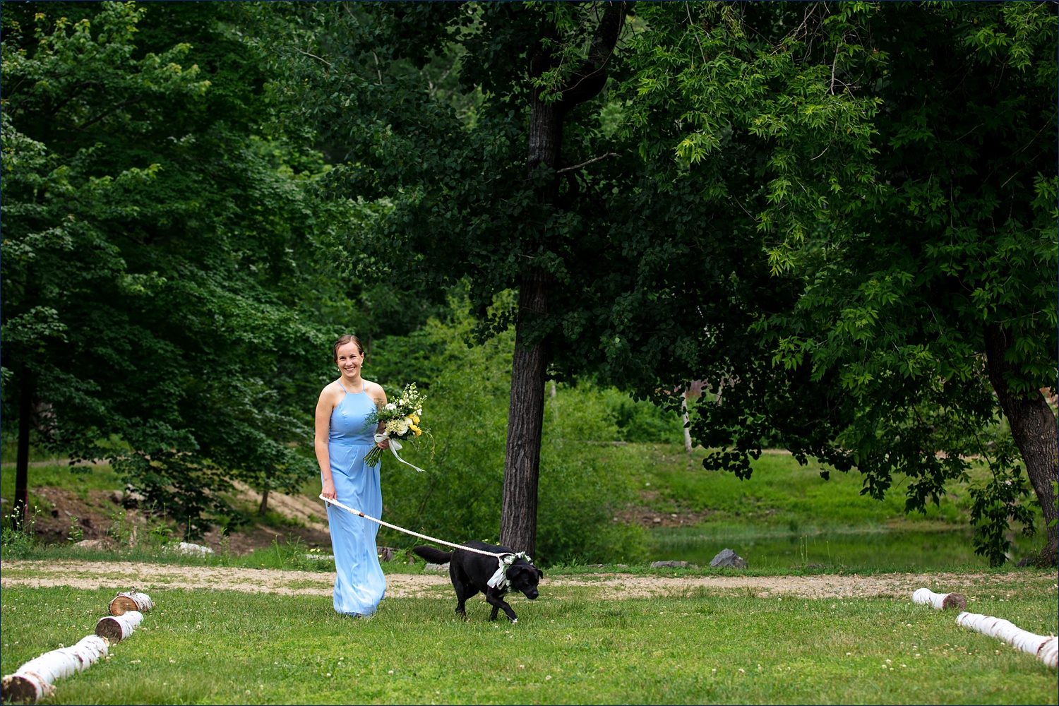 Maid of Honor walks the couple's dog down the aisle 
